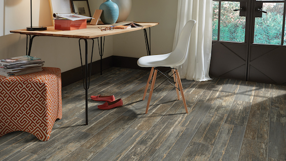 wood look tile flooring ina charming rustic office